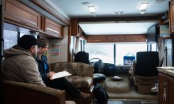 people sitting in a RV