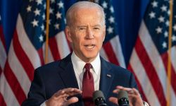 Biden speaks at podium