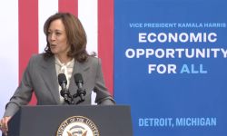 Vice President Kamala Harris speaking into the microphone