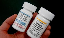 Person holds two HIV prevention drugs