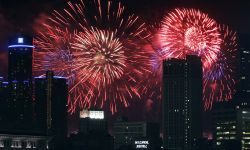 Red and blue fireworks in the sky. 