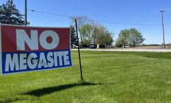 A sign that says "No Megasite." 