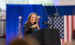  Secretary of State Jocelyn Benson speaking to a crowd. 