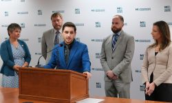 Lawmakers speak at a press conference in Lansing, Michigan.