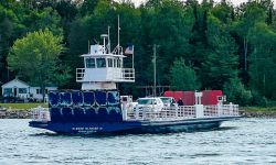A white and blue ferry. 