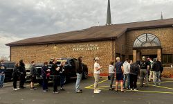 People standing outside a church to vote in the November 2024 election.