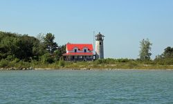 Red and white lighthouse. 