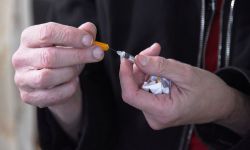 Someone holding needles. 