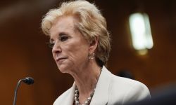 U.S. Education Secretary Linda McMahon wears a white blazer.