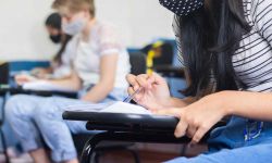 kids in classroom taking test