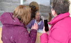 Stacy Doubrava and Sarah Maynard visit their mother Mary Jane Schoendorf at the Ovid Healthcare Center