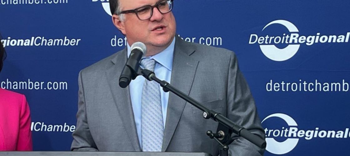 Matt Hall speaking into a microphone.