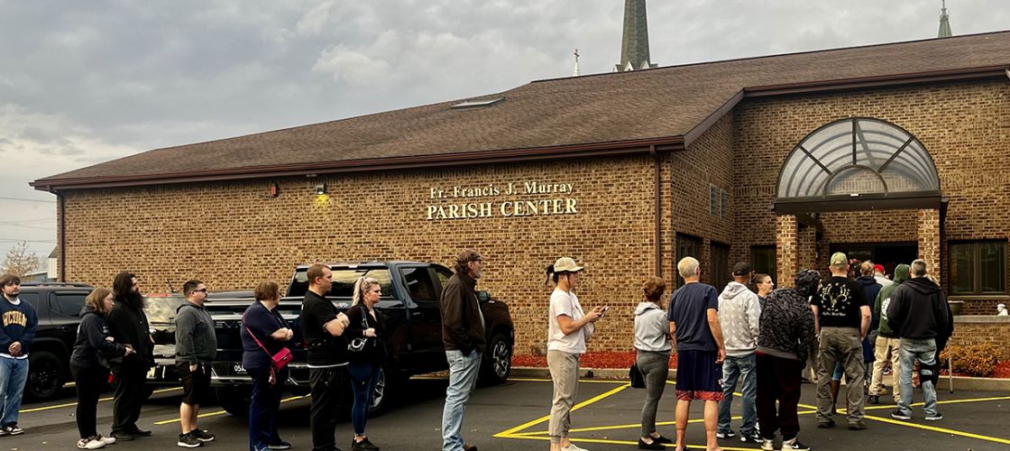 People standing outside a church to vote in the November 2024 election.