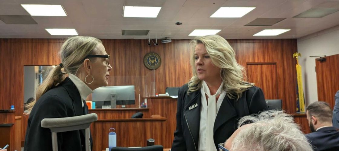 Michele Lundgren and Meshawn Maddock in a courtroom. 