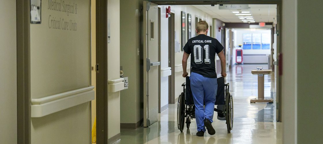 Someone pushes a wheelchair in Hillsdale Hospital in Michigan.
