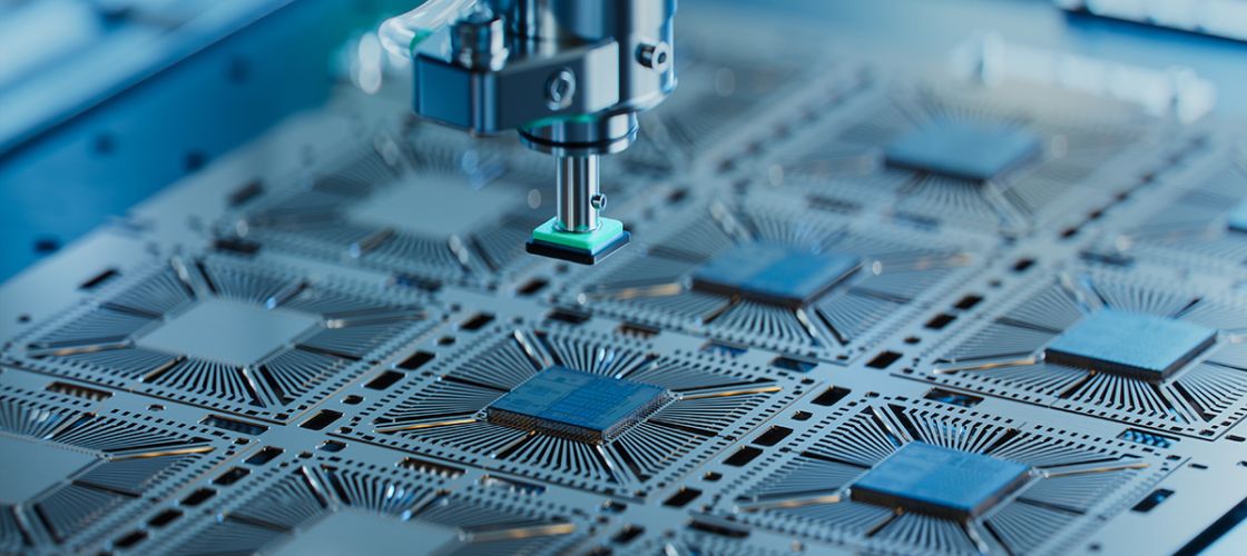 Close-up of Silicon Die are being Extracted from Semiconductor Wafer and Attached to Substrate by Pick and Place Machine. 